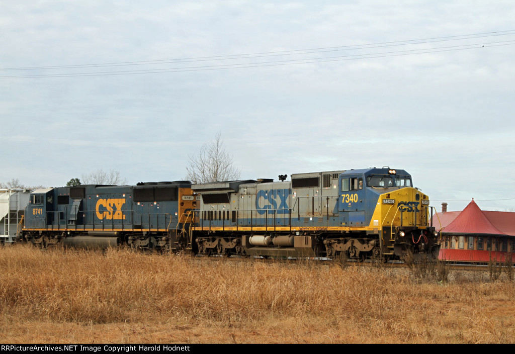 CSX 7340 & 8741 lead a train towards the yard